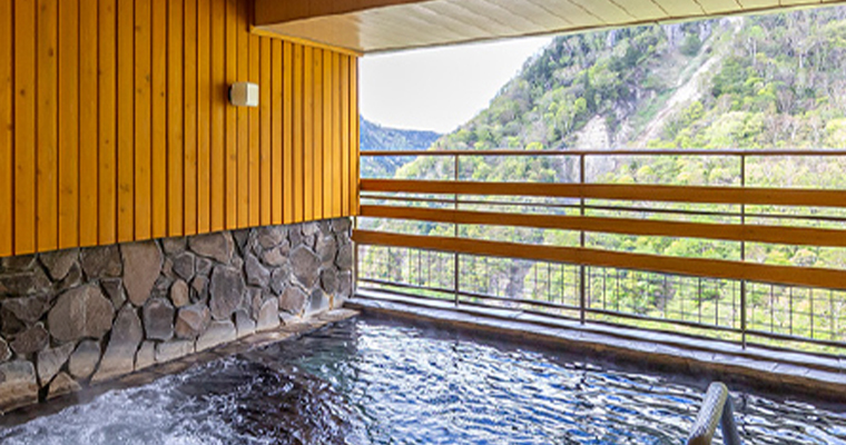 Japan SounkyoOnsen OnsenResortHotel HotelTaisetsu Grand public bath with a view